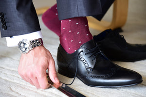 Men's fashion socks for a formal outfit, burgundy with grey polka dots
