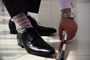 Men's pink striped socks for a formal occasion matching pink dress shirt