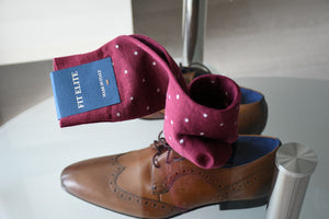 Express yourself with our stylish burgundy polka dot dress socks for men